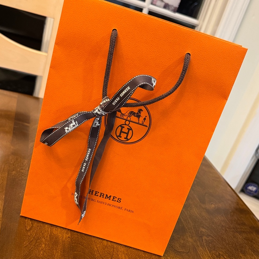 Hermès Vibrant Orange Bag with Dark Ribbon